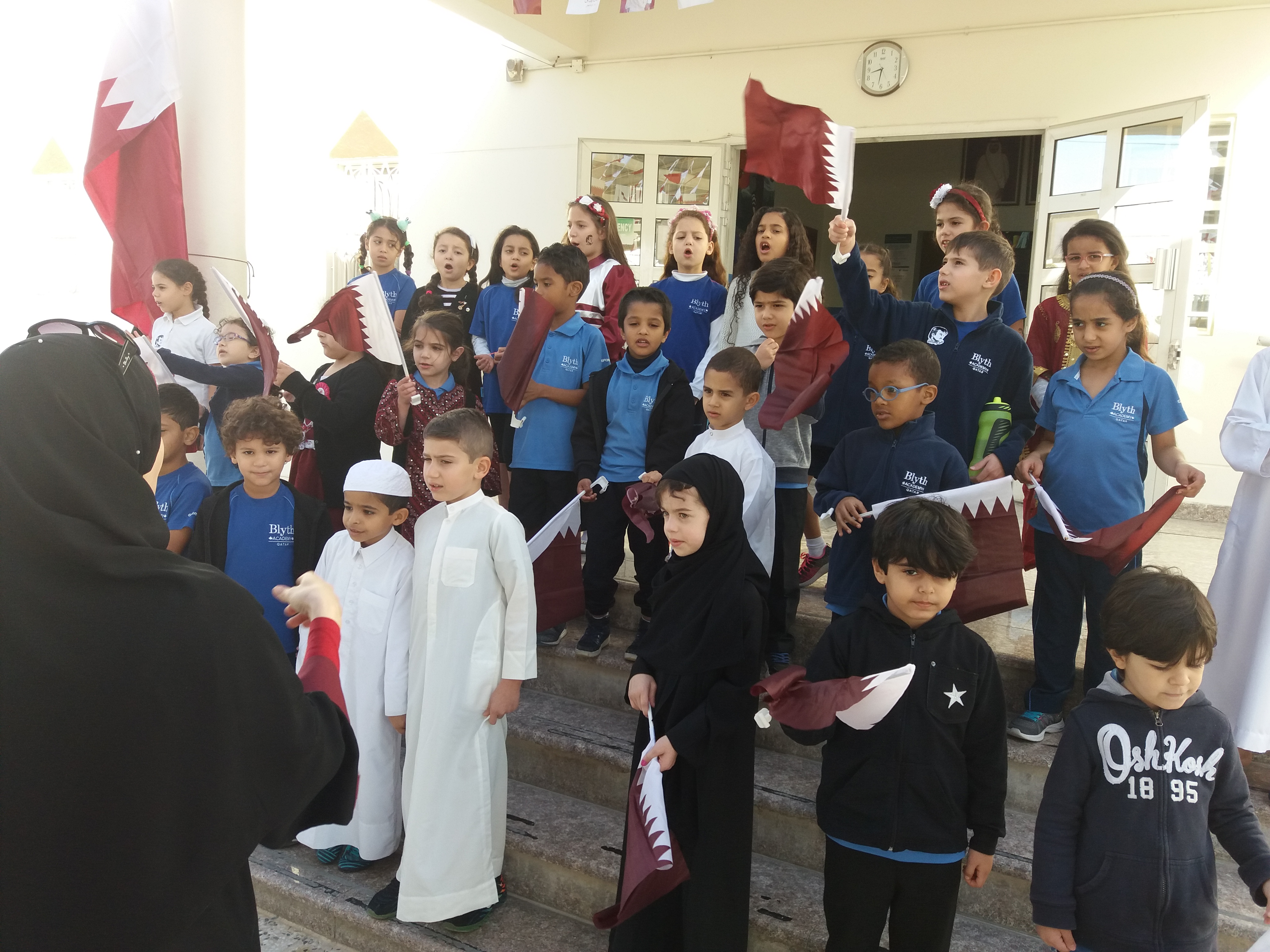 Students singing on Qatar National Day